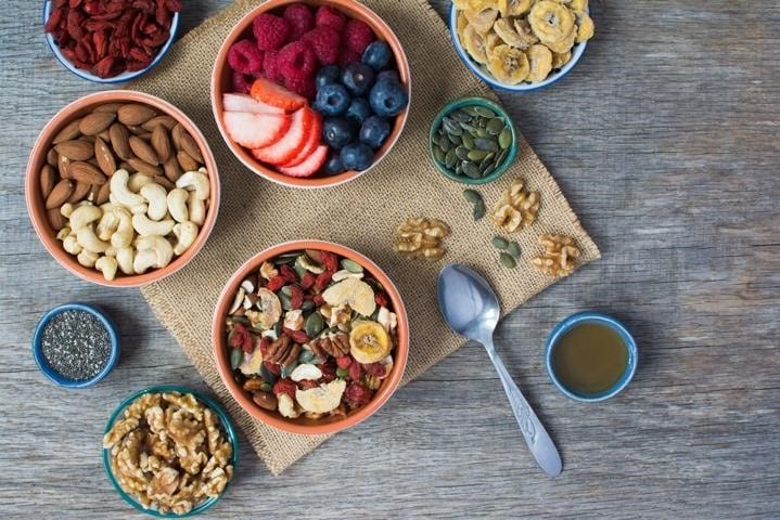 natural fruits and dry fruits in bowls